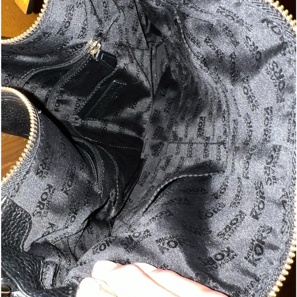 Black bag with gold hardware. - Picture 3 of 6